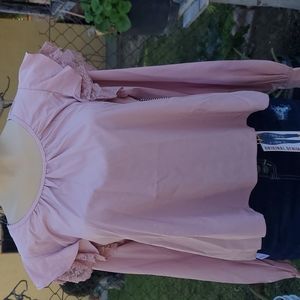 Pink long sleeve with ruffles on the shoulder